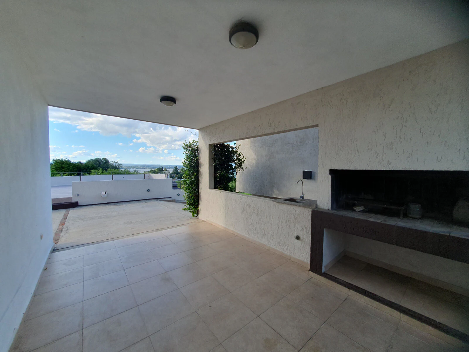 Espacios comunes y exteriores · Asadores y terraza · Costa Linda
